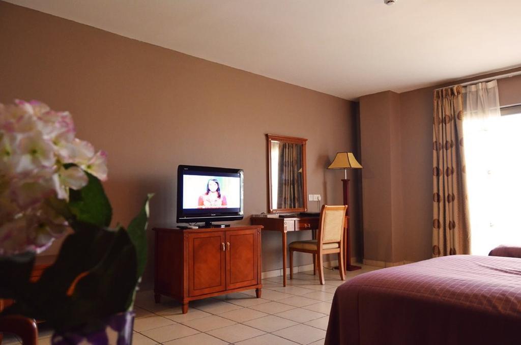 Mensvic Grand Hotel Аккра Номер фото